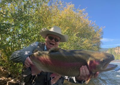 Unbelievable big rainbow trout from a guided fly fishing trip to private water near Denver.