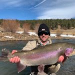 Ty Blount with a 10lbs class Rainbow Trout for a private water lease.
