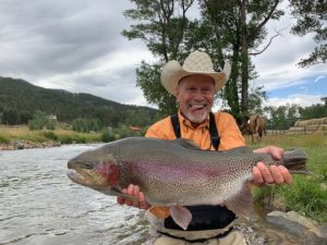 fish of a lifetime from a guided fly fishing trip with Colorado trout hunters.