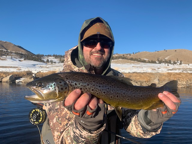 Angelo Arias with a winter brown trout from the Dream Stream.