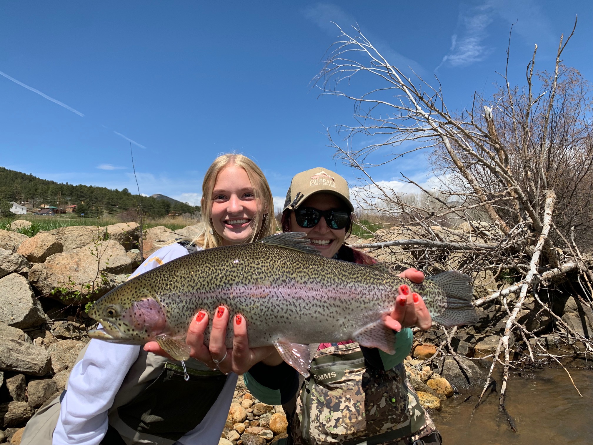 A large rainbow trout from a private water guided fly fishing trip to the North Fork of the South Platte.