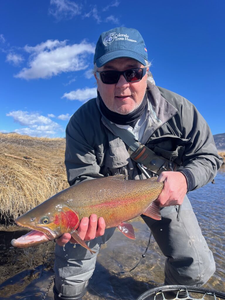CTH guide Frank Orten with a big lake run Dream Stream fish.