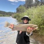 Huge fish on a corporate fly fishing trip to Rawhide Ranch