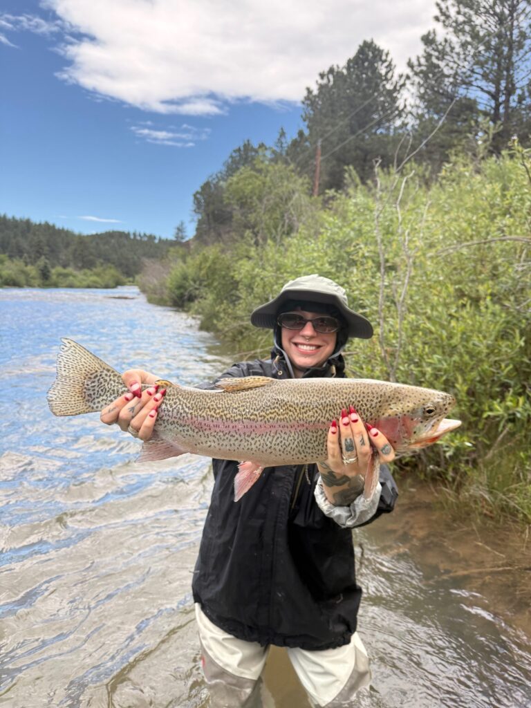 Huge fish on a corporate fly fishing trip to Rawhide Ranch