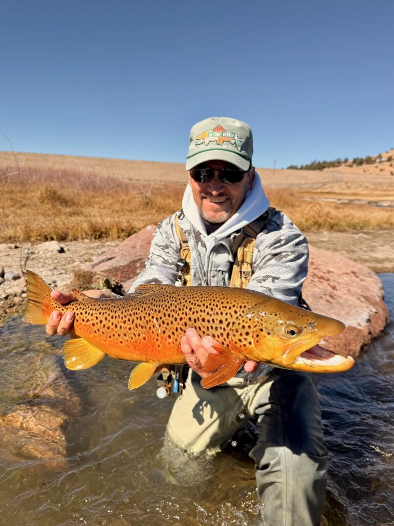 Jim and a big fall brown trout with guide Matt Sendersen