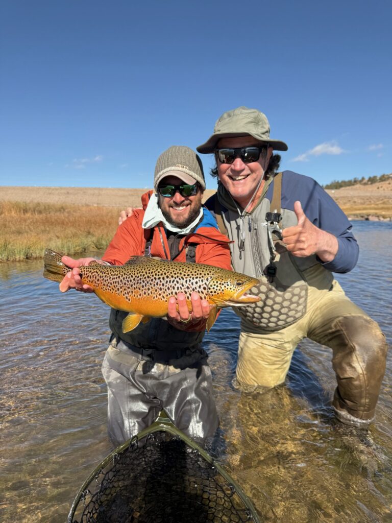 Danny Frank and Larry with a big Dream Stream female brown trout