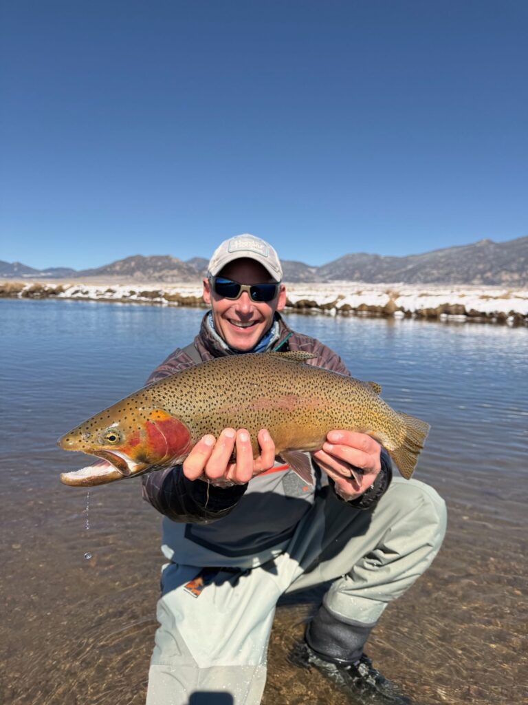 CJ and another big Dream Stream fish from a trophy trout guided trip.