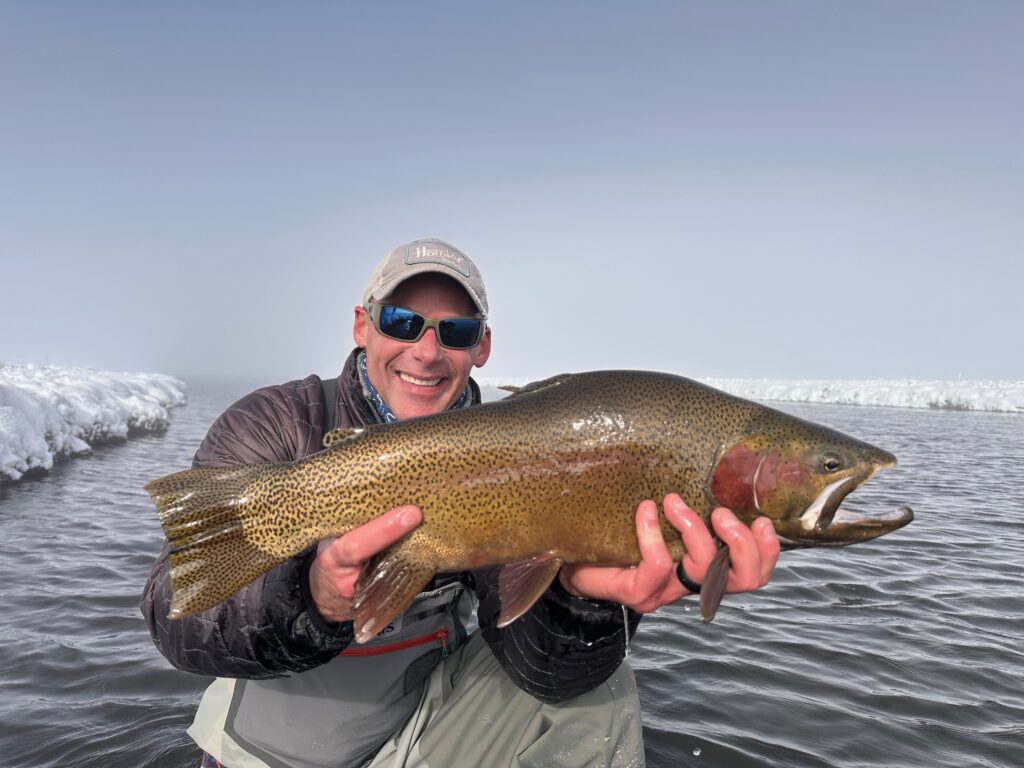 CJ with a giant South Platte Cutbow