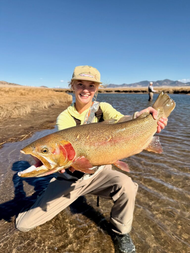 Katie and a giant trout from a trophy trip with guide Matt Sandersen