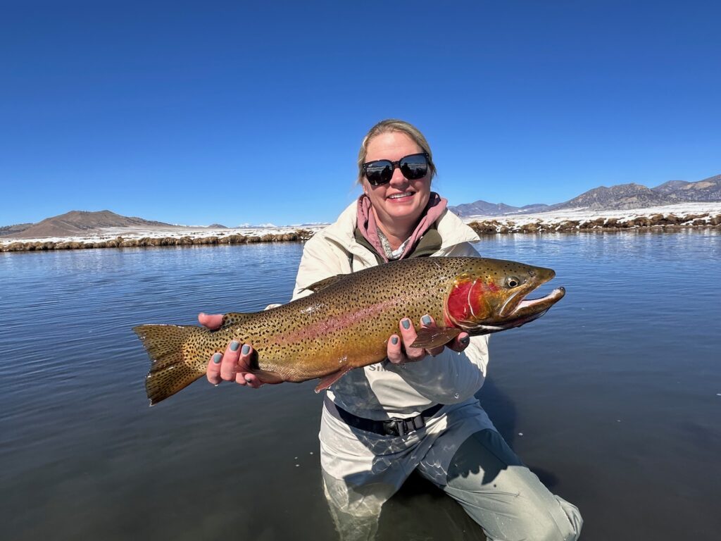 Mandi Cabana with a big Dream Stream cutbow.